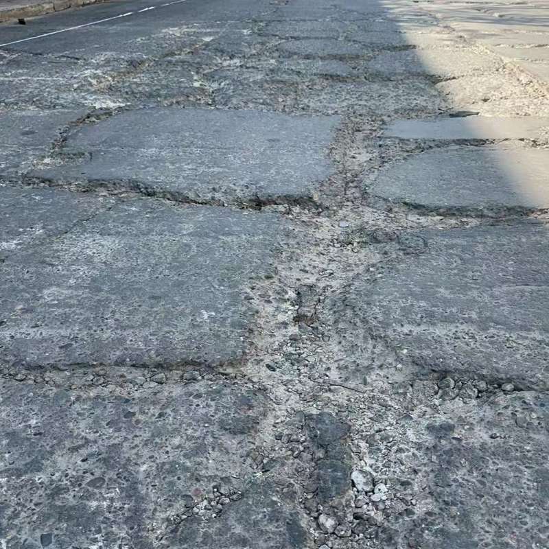 灯塔路面起砂露石子修补料